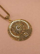 Golden chain with pendant